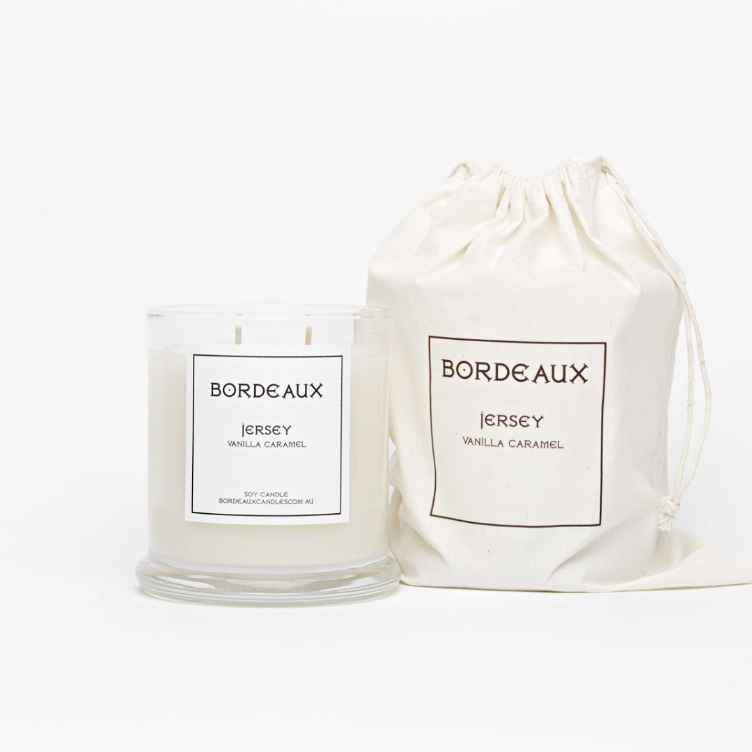 Vanilla Caramel Fragrance in a classic glass vessel with knob lid in a cotton drawstring bag | 380g candle | Bordeaux Candles