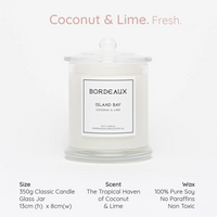 Thumbnail for coconut and lime island bay candle in a classic glass vessel with knob lid on and two wicks | Bordeaux Candles | Bordeaux Collective