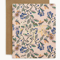 Greeting card with floral design and 'Congratulations' text on a beige background