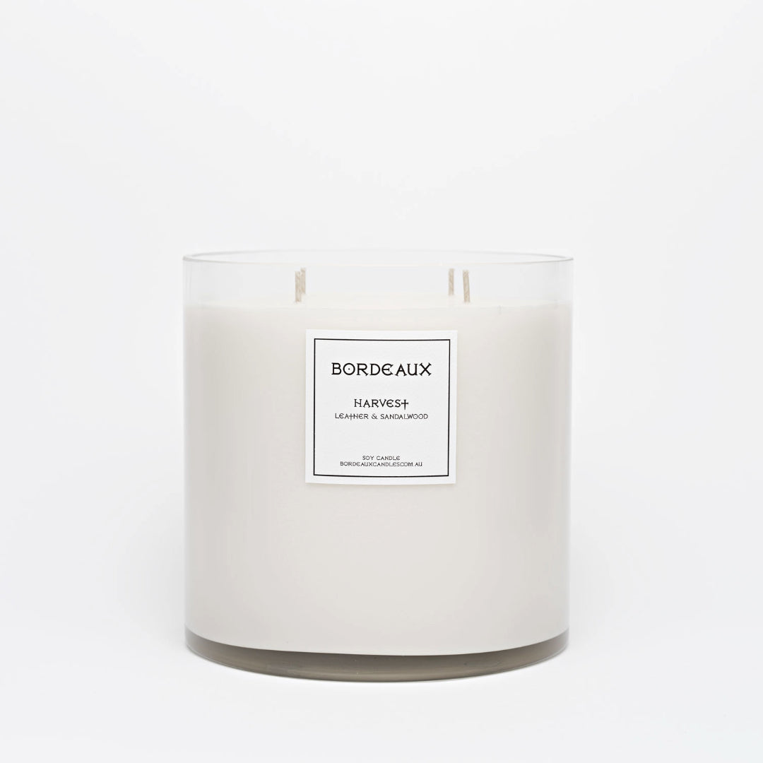 Leather and Sandalwood in oversized glass vessel with white label and 4 wicks | Bordeaux Collective | Bordeaux Candles